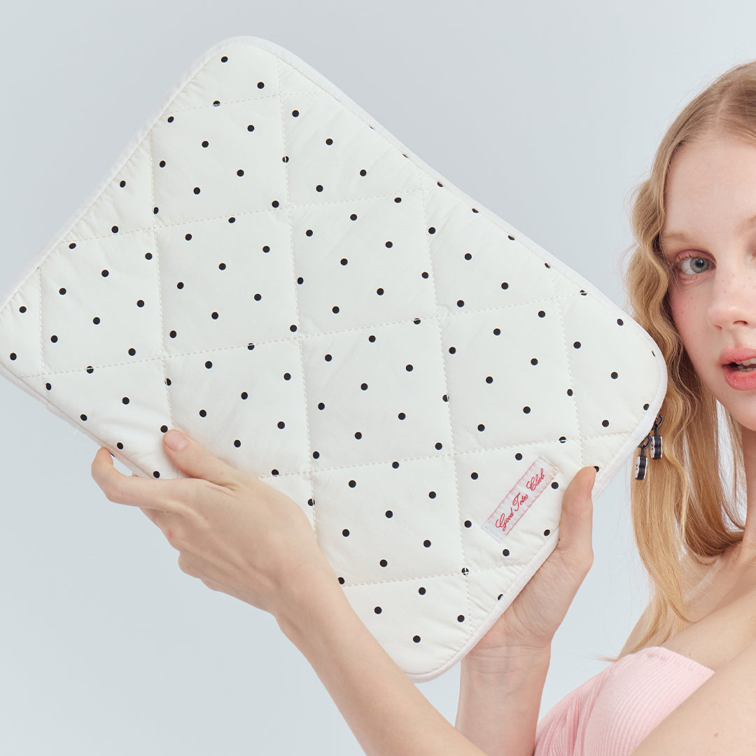 White polka dot laptop pouch