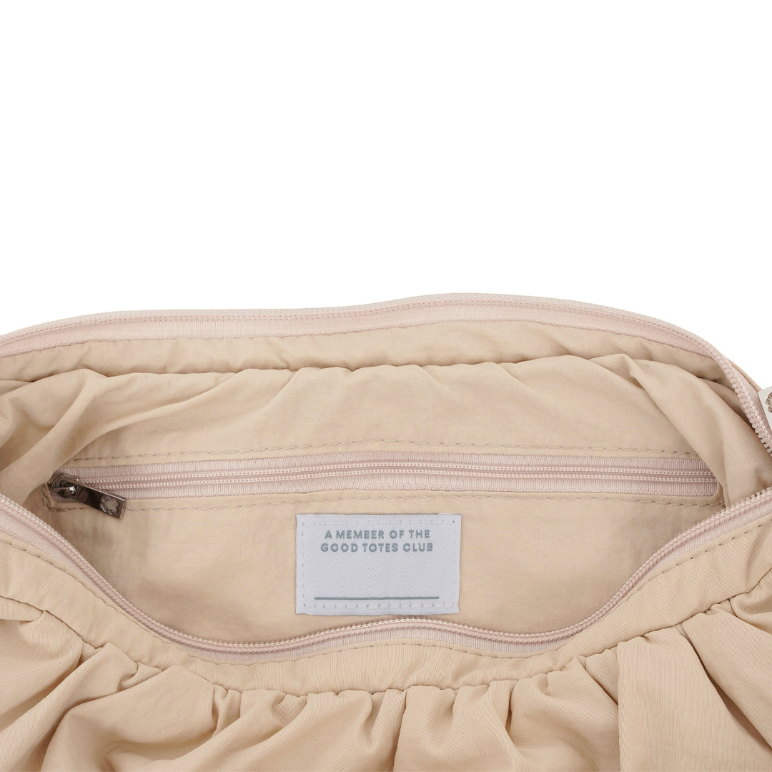 Small Croissant Sling (Almond)